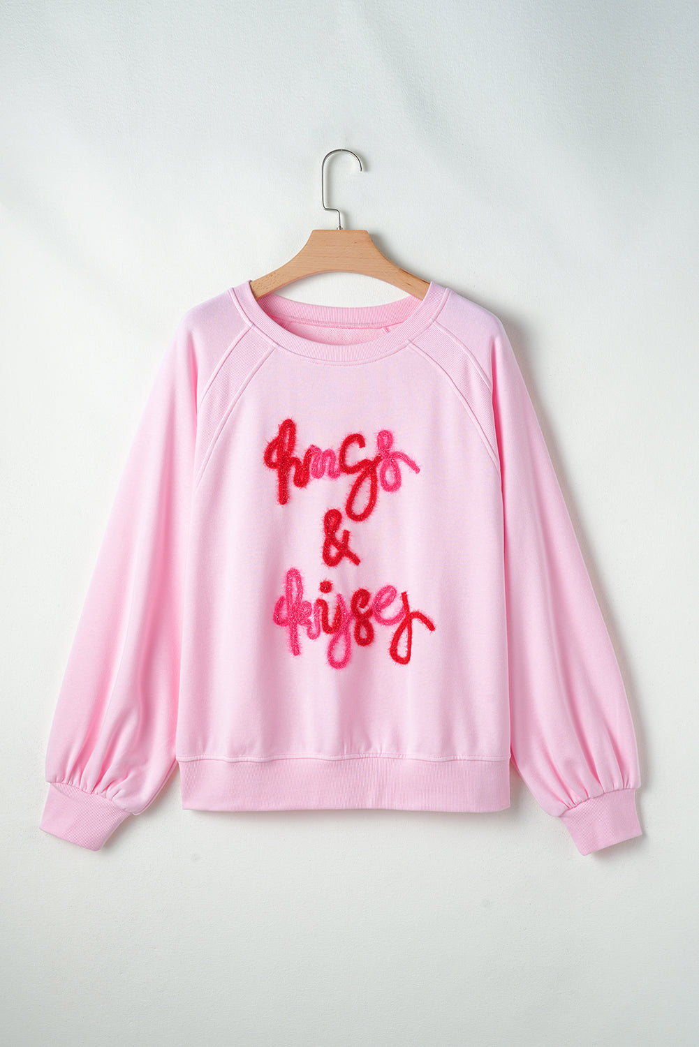 Sudadera de cuello redondo ABRAZOS Y BESOS de San Valentín