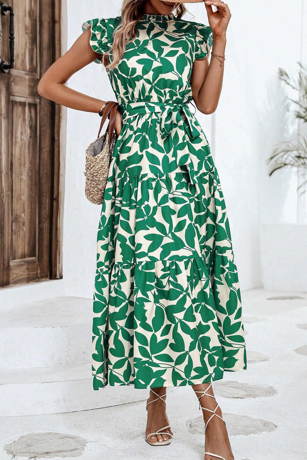Vestido sin mangas con cintura alta, cuello alto, volantes y estampado de hojas verdes