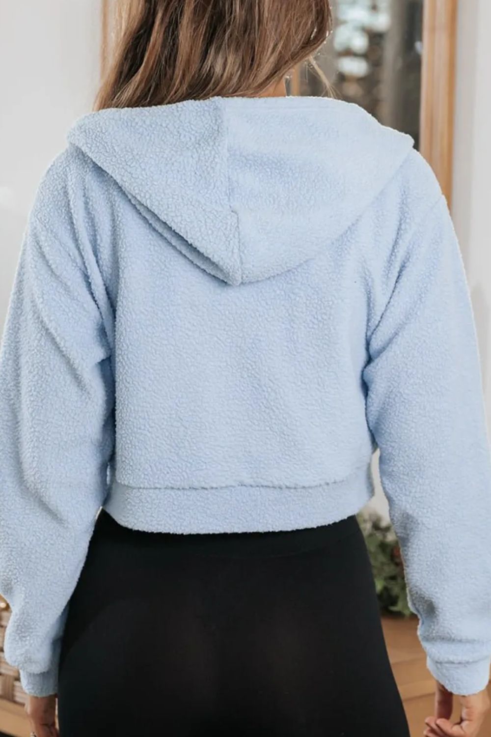 Sudadera con capucha y manga larga con cremallera y cordón
