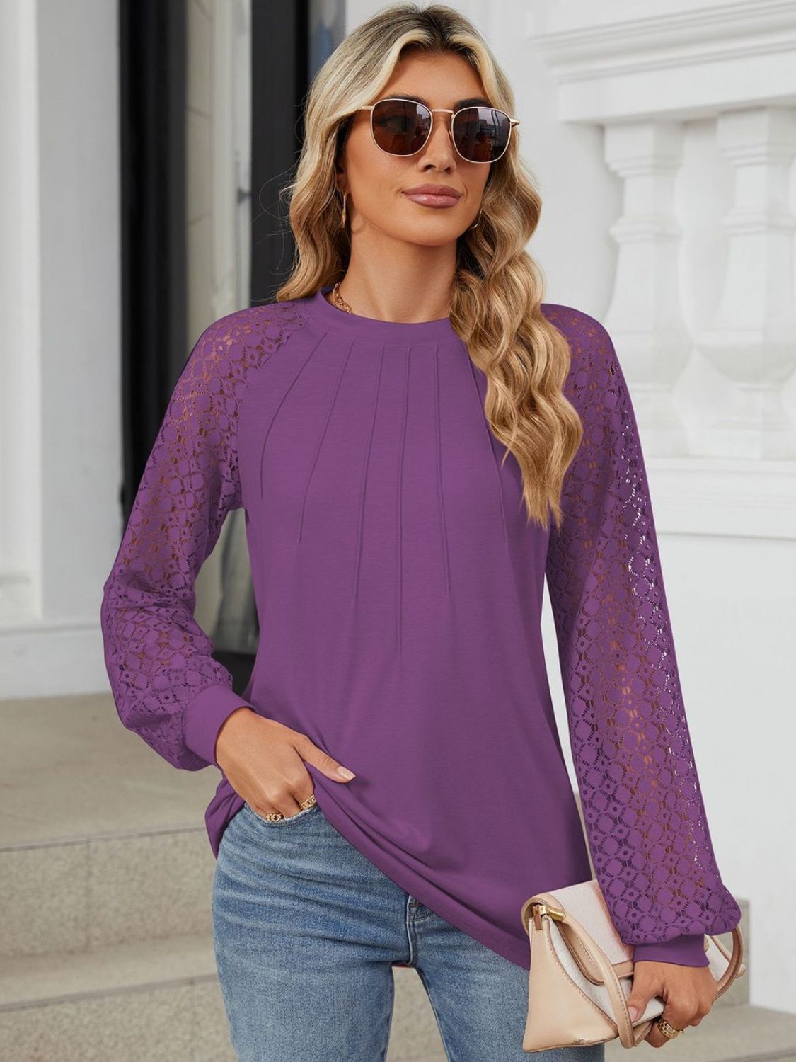 Blusa de manga larga con encaje y cuello redondo