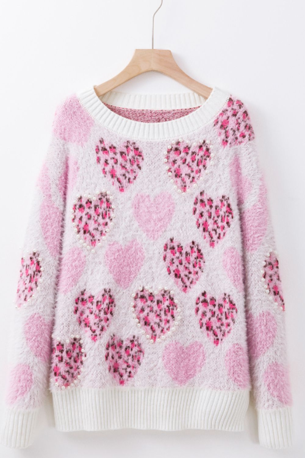 Suéter de cuello redondo con corazón y detalle de perla