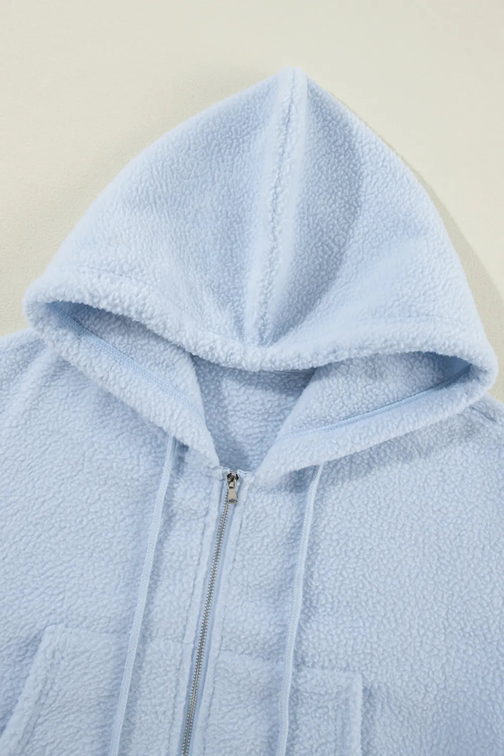 Sudadera con capucha y manga larga con cremallera y cordón