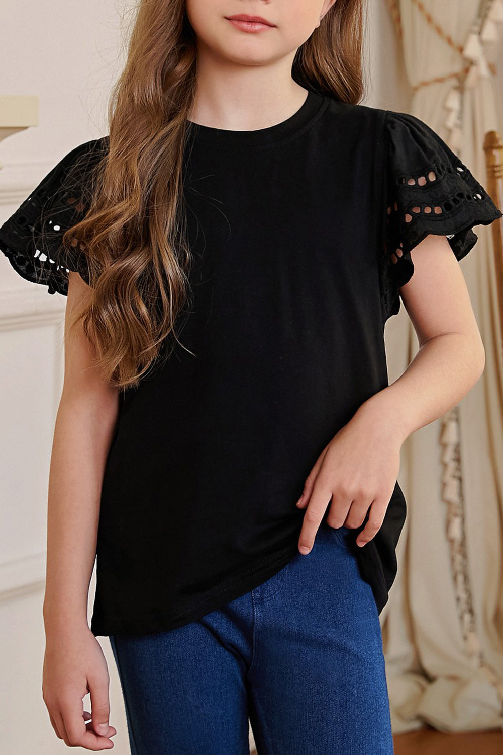 Camiseta con cuello redondo y mangas onduladas