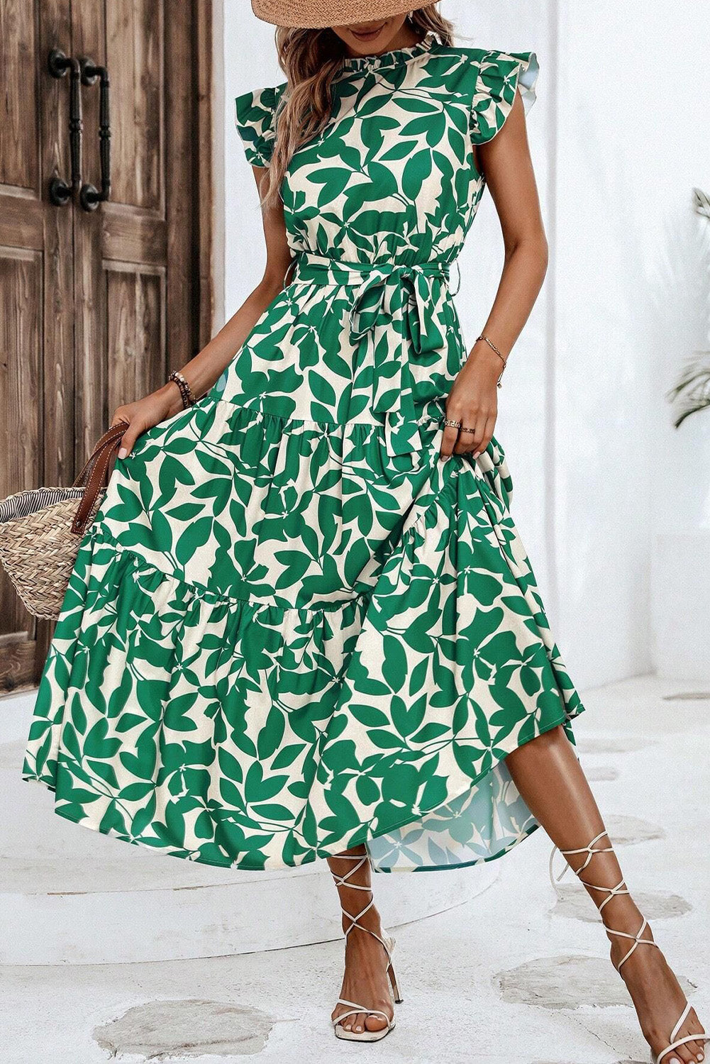 Vestido sin mangas con cintura alta, cuello alto, volantes y estampado de hojas verdes