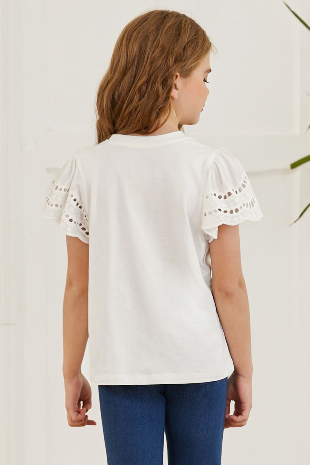 Camiseta con cuello redondo y mangas onduladas