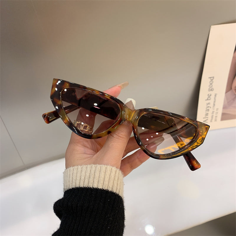 Gafas de sol informales con montura grande y forma de ojo de gato para mujer