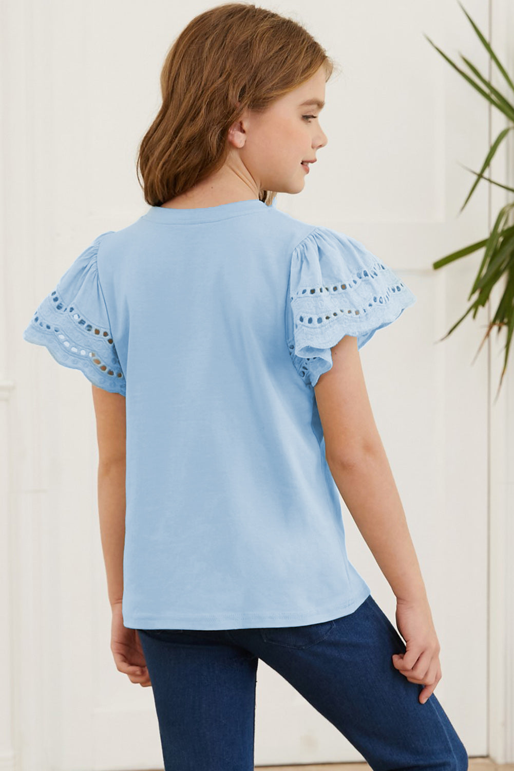 Camiseta con cuello redondo y mangas onduladas