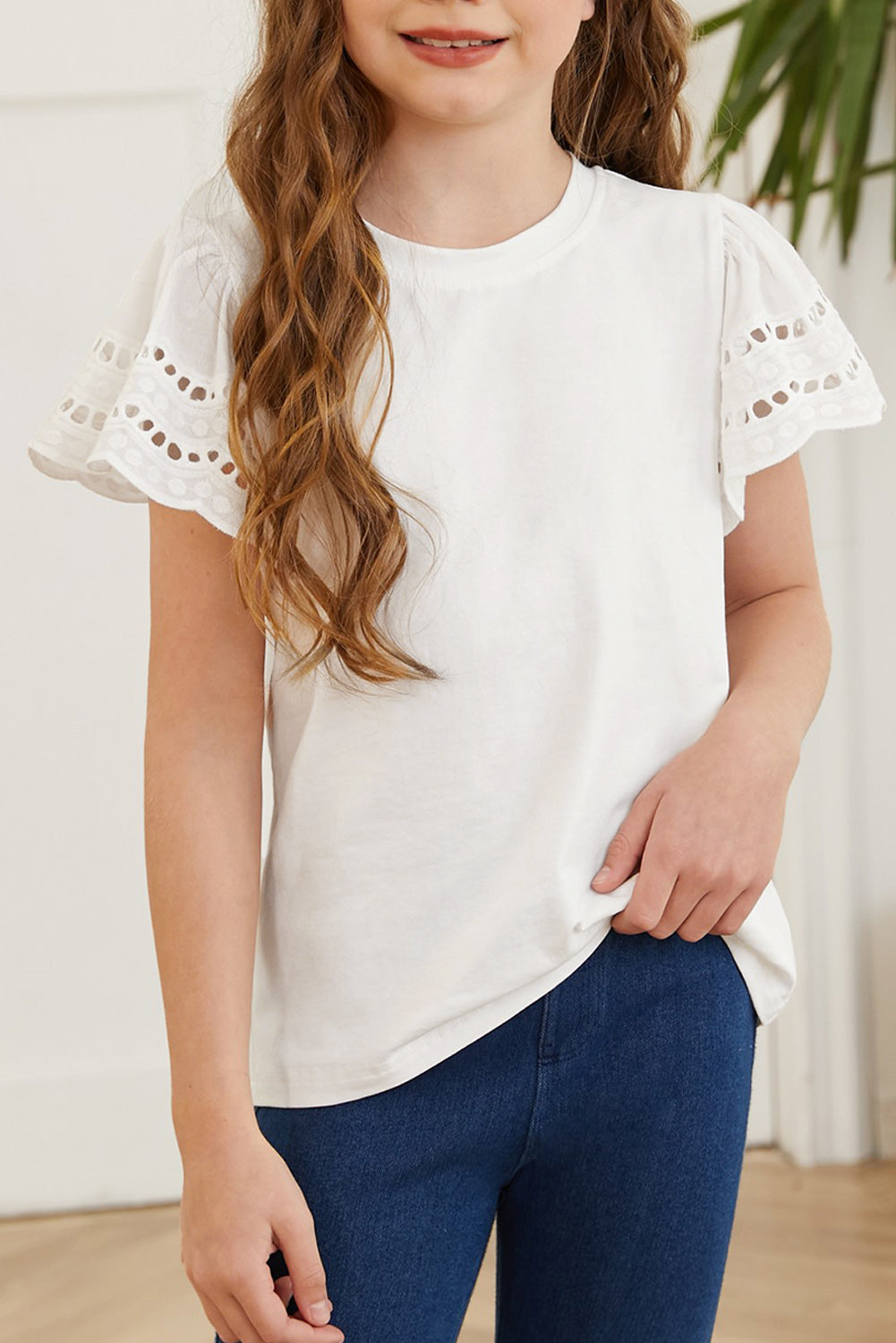 Camiseta con cuello redondo y mangas onduladas