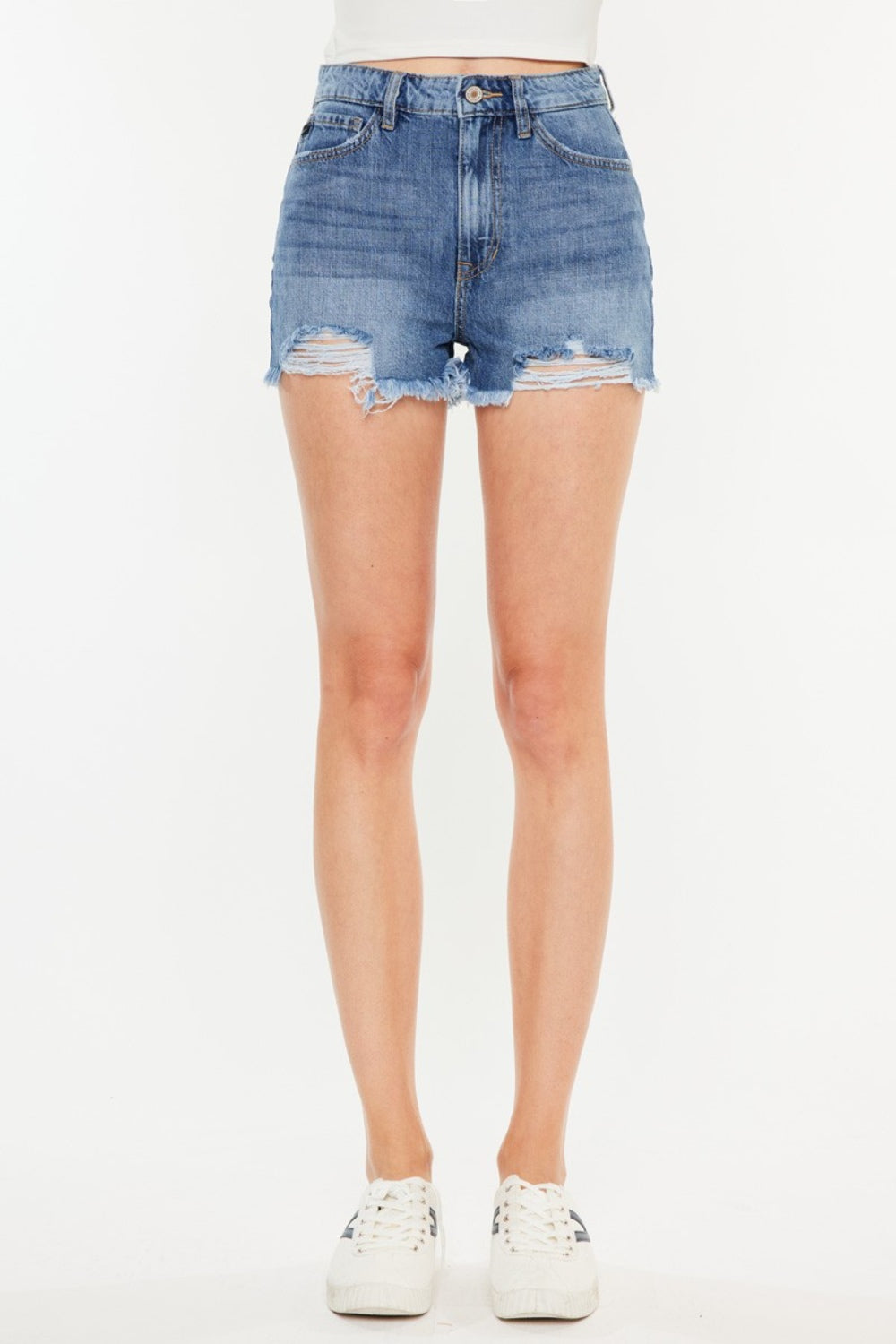 Pantalones cortos de mezclilla de cintura alta con dobladillo sin rematar y desgastado de Kancan
