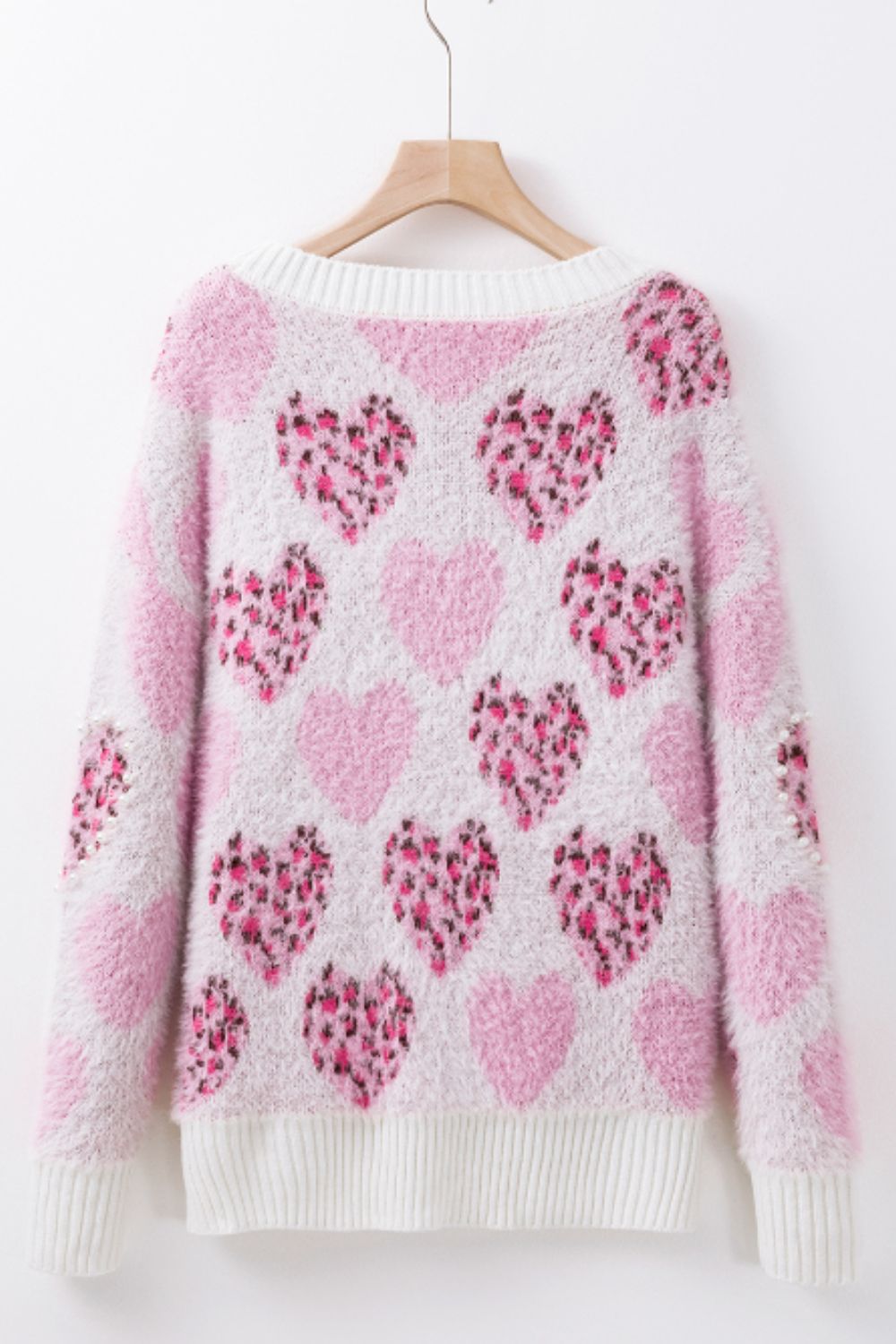 Suéter de cuello redondo con corazón y detalle de perla