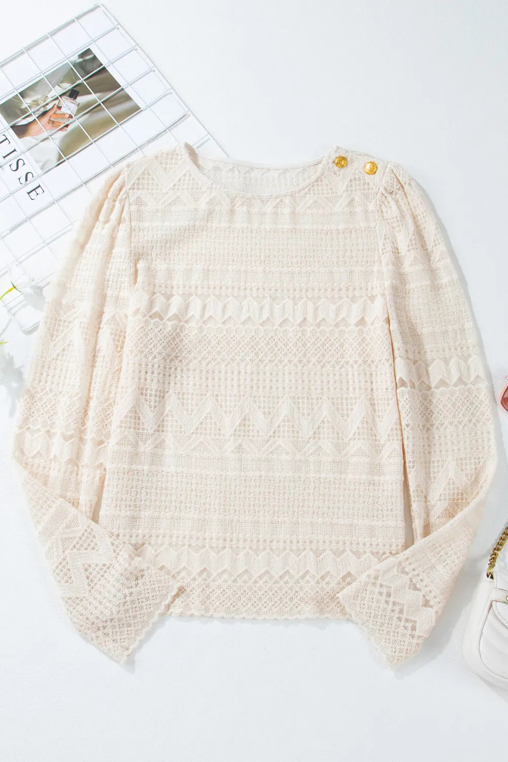 Blusa de encaje con cuello redondo y manga larga