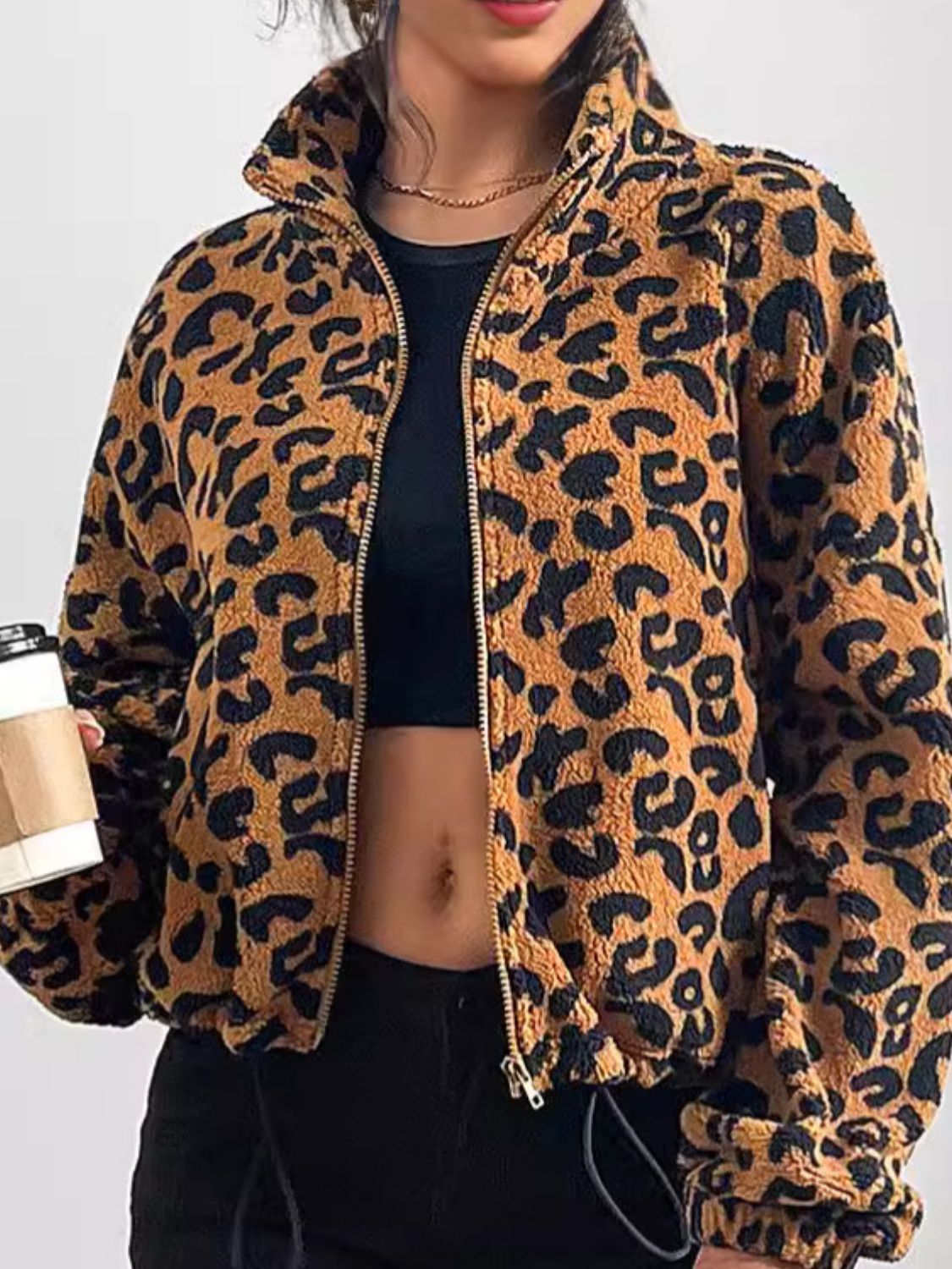 Chaqueta de manga larga con cremallera y estampado de leopardo