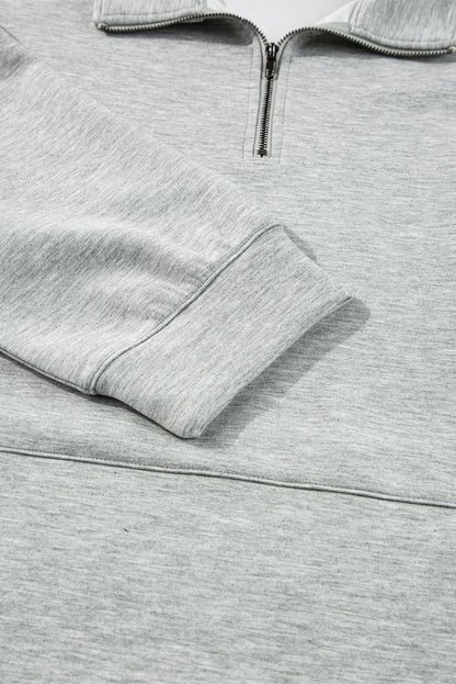 Conjunto de camiseta de manga larga con media cremallera y pantalones cortos con cordón