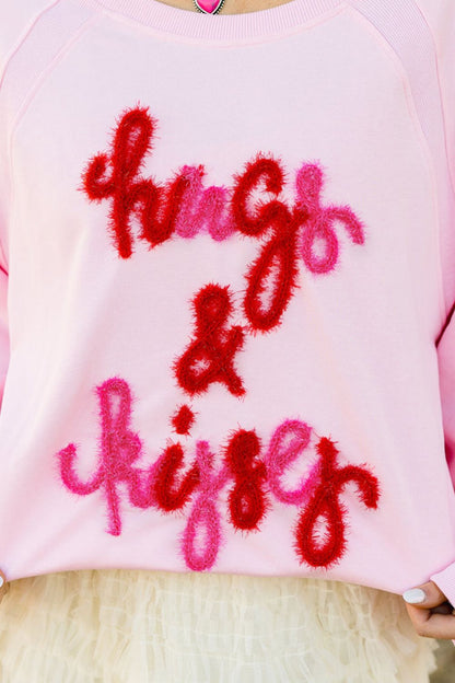 Sudadera de cuello redondo ABRAZOS Y BESOS de San Valentín
