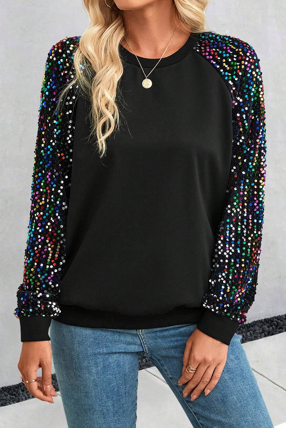 Blusa de manga larga con cuello redondo y lentejuelas