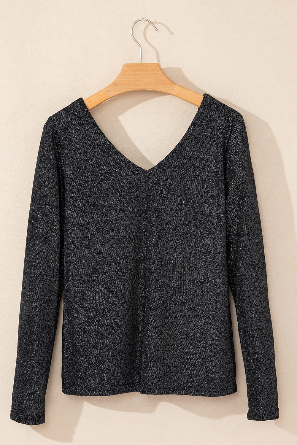 Blusa de manga larga con escote en V y lazo