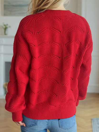 Suéter de cuello redondo y hombros caídos con diseño calado