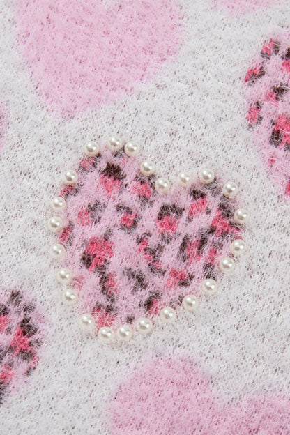 Suéter de cuello redondo con corazón y detalle de perla