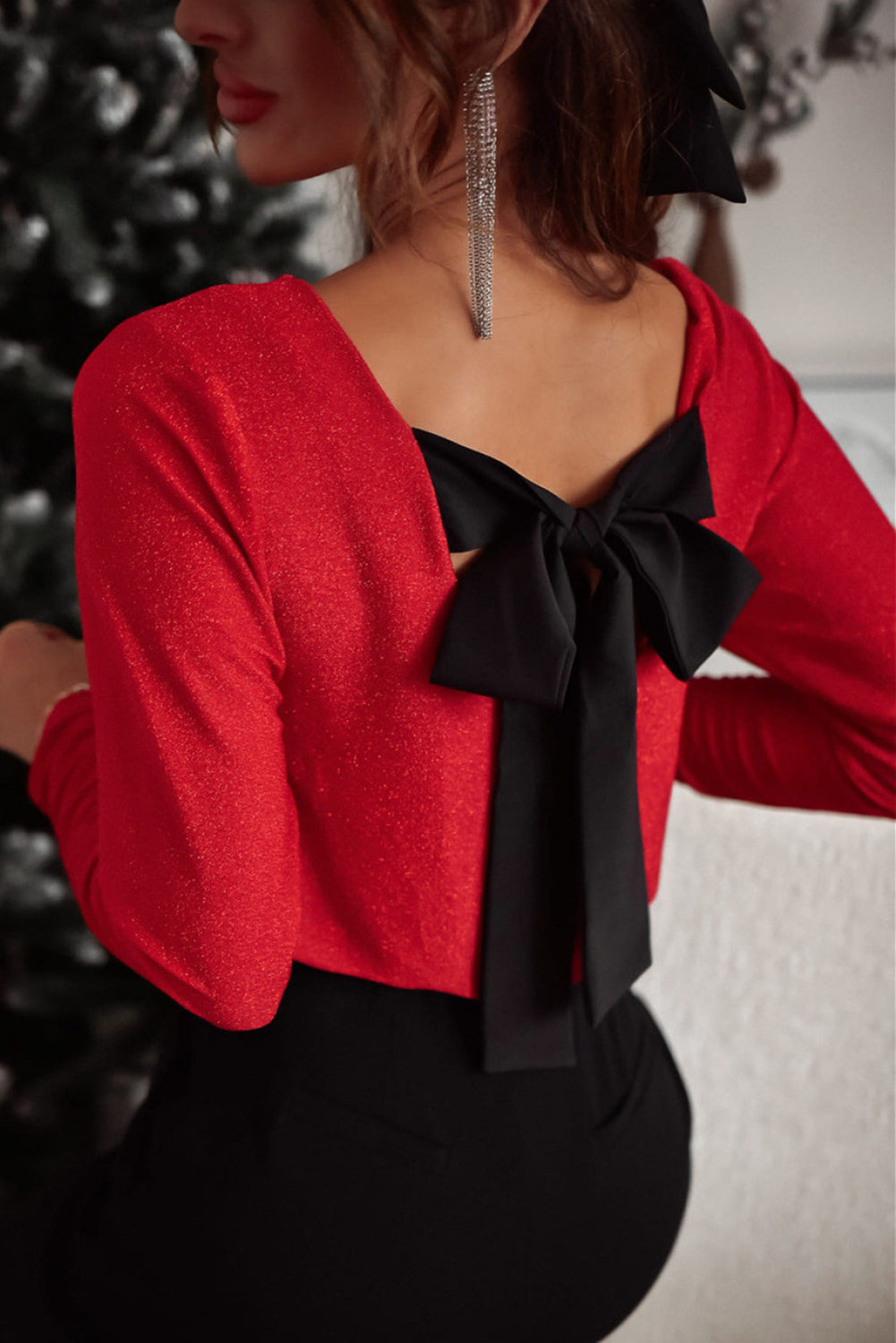 Blusa de manga larga con escote en V y lazo