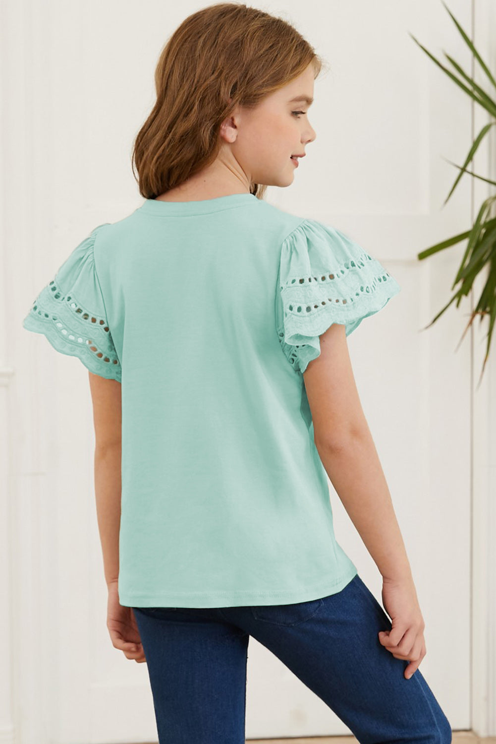 Camiseta con cuello redondo y mangas onduladas