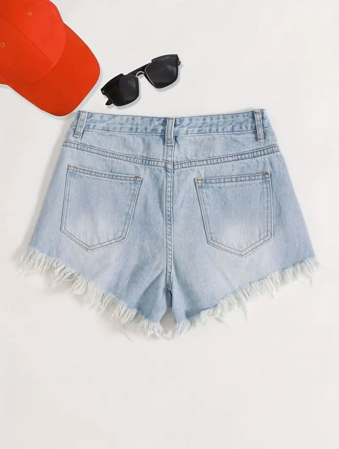 Pantalones cortos de mezclilla desgastados con cintura alta y cierre de botón y cremallera para mujer