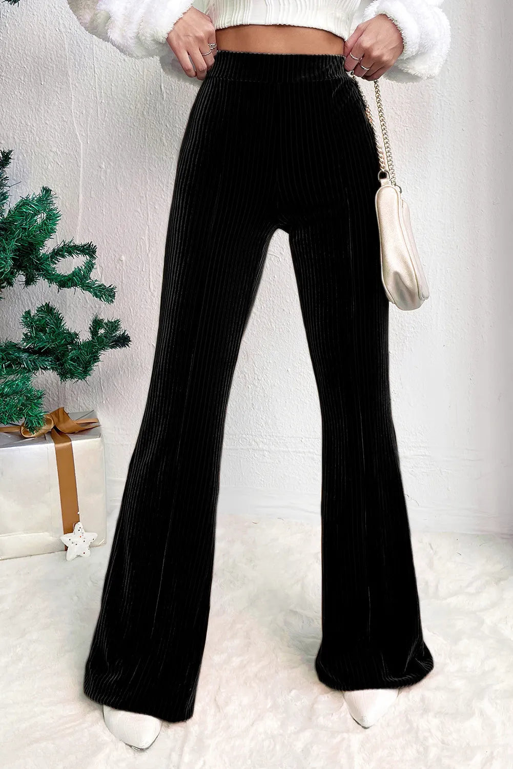 Pantalones de tiro alto con corte acampanado