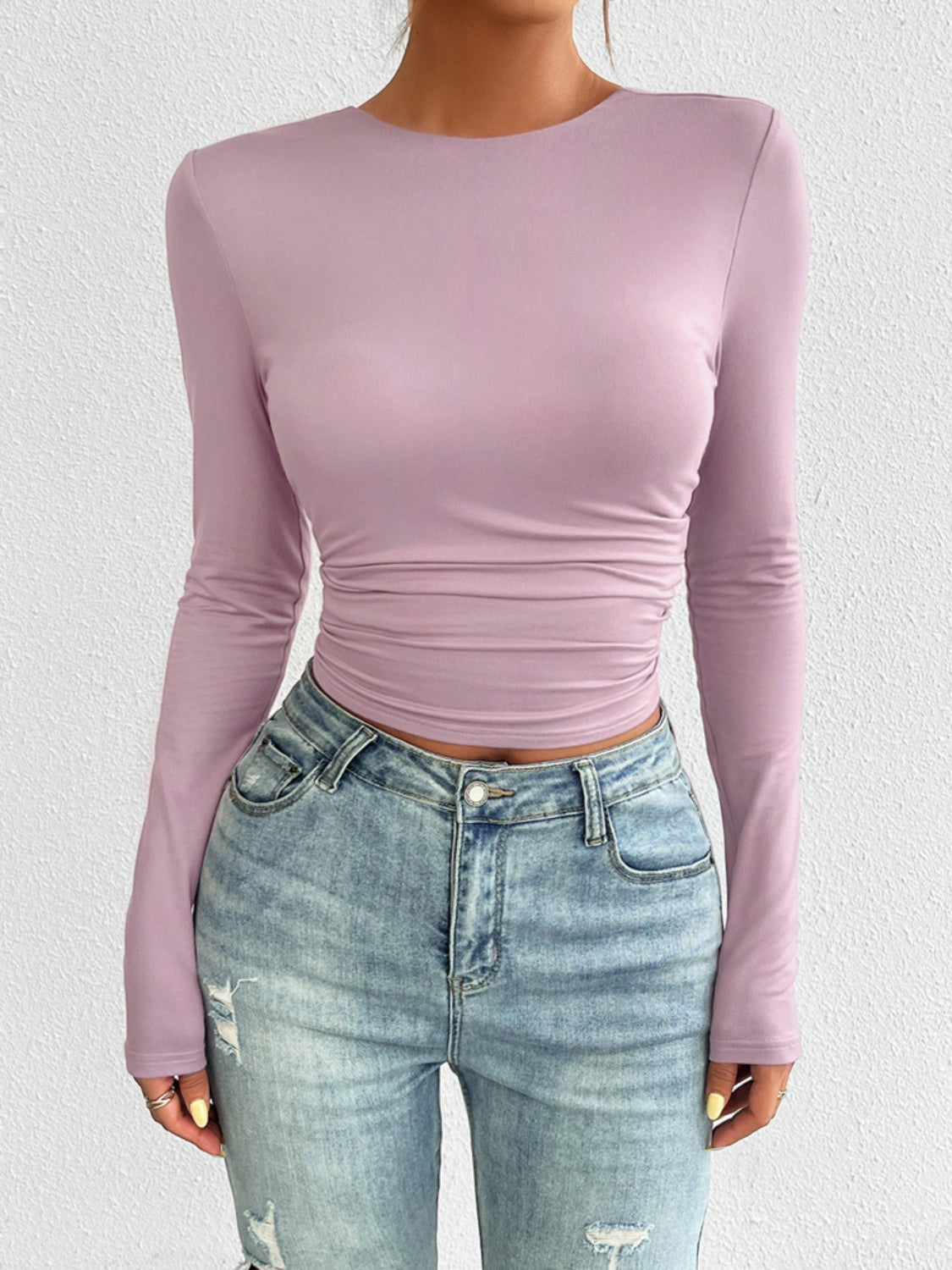 Camiseta de manga larga con cuello redondo y espalda descubierta